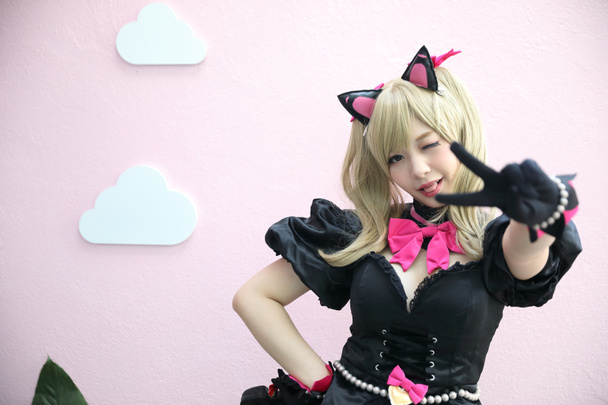 Japani anime cosplay, muotokuva tyttö cosplay vaaleanpunainen huone takaisin
 - Valokuva, kuva