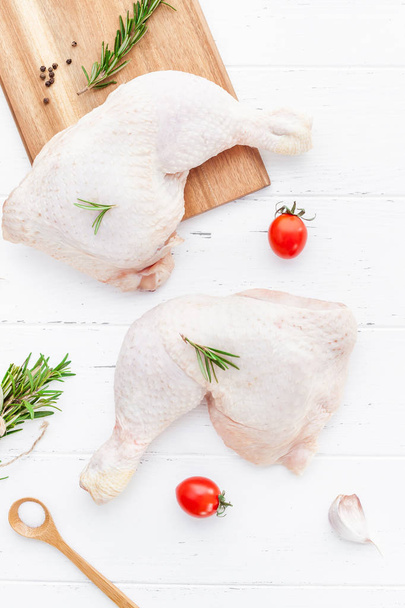Fresh raw chicken legs with herbs. Cooking concept - Fotoğraf, Görsel