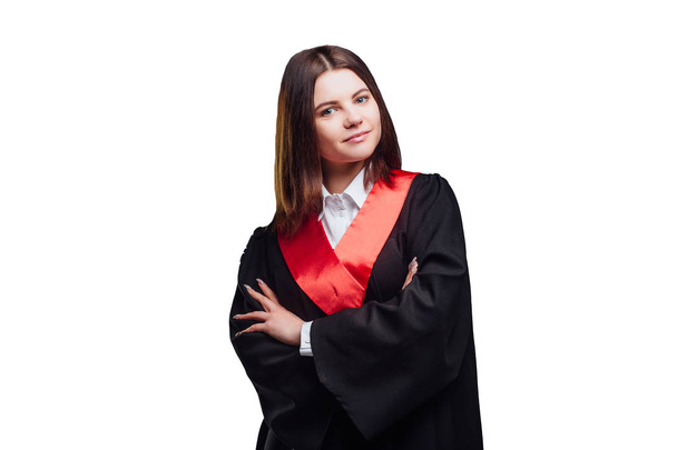 Young brunette graduate woman in mantle isolated on white background - Foto, Imagem