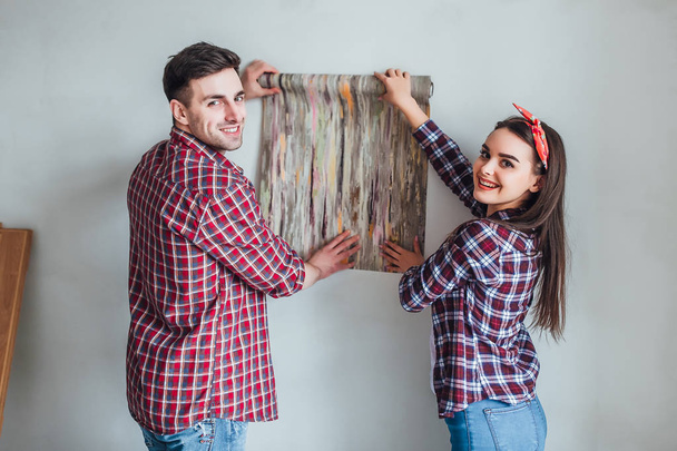 Young couple doing apartment repair together  - Photo, Image