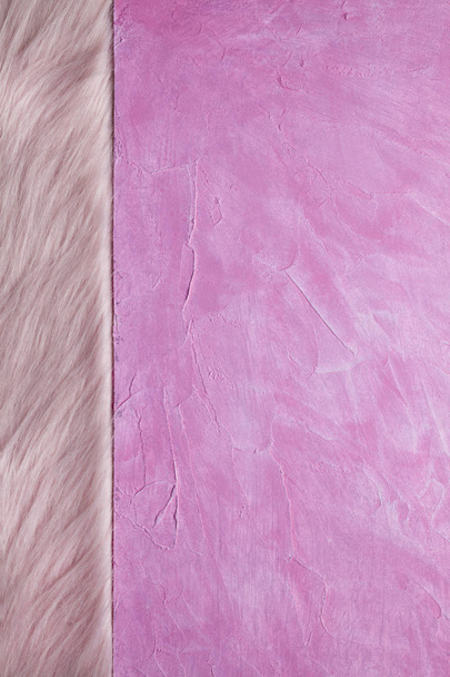 Double-layered background - pink plaster surface and pink fur - Foto, immagini