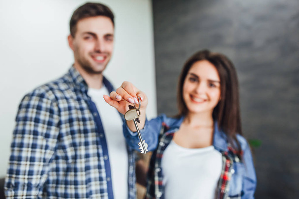 woman holding keys from new building, selective focus - Photo, image