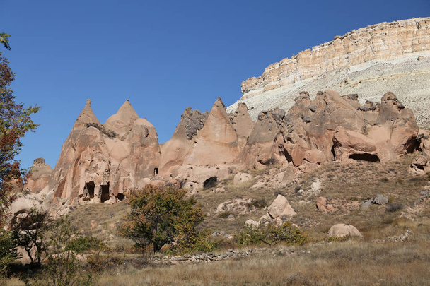 Скальные формации в Zelve Valley, Cappadocia, Nevsehir, Turkey
 - Фото, изображение