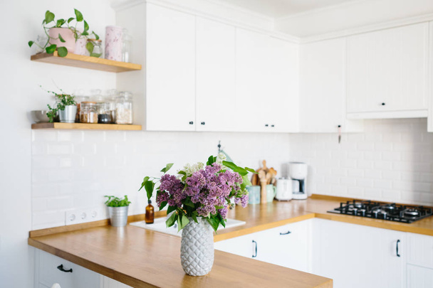 Modern white kitchen in scandinavian style. - Фото, изображение