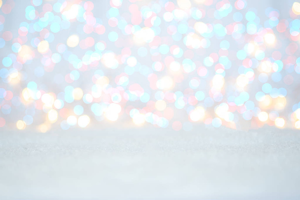 Christmas glowing background. Christmas lights. Holiday New year or Christmas abstract glitter defocused background with blinking stars and sparks. Blurred bokeh. - Fotoğraf, Görsel