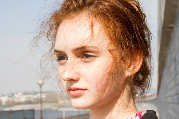 Red-haired girl with freckles on her face - Foto, imagen