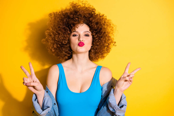 Close-up portrait of her she nice cute lovely sweet feminine girlish winsome charming attractive cheerful cheery girl showing double v-sign isolated over bright vivid shine yellow background - Φωτογραφία, εικόνα