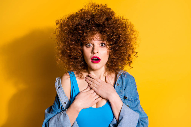 Close up photo beautiful amazing she her lady wavy fluffy styling curls hands arms chest eyes full fear not me wear casual jeans denim shirt shorts blue tank top clothes isolated yellow background - Foto, Imagem
