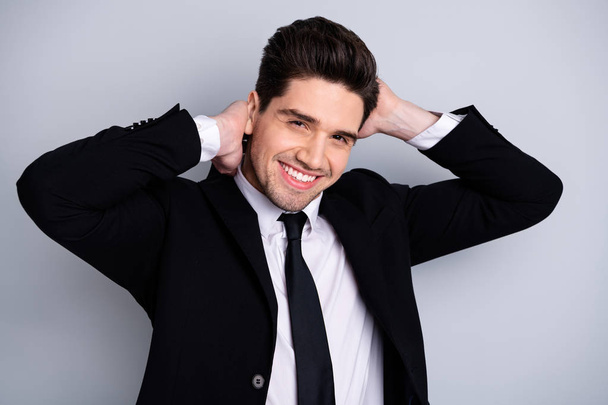 Close up photo amazing he him his macho handsome just visited hairdresser touch perfect styling black hair both hands arms wear specs shirt suit jacket tie formalwear isolated grey background - Fotografie, Obrázek