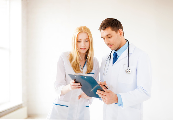 Two young attractive doctors - 写真・画像
