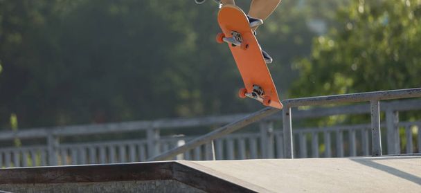 active skateboarder skateboarding in skate park - Фото, изображение