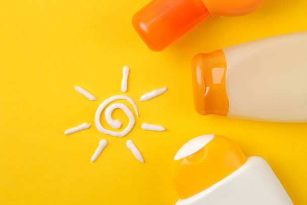 sunscreen remedy. various sunscreens and sun cream on a bright yellow background. Sun protection. Ultraviolet protection. Summer. top view. - Photo, Image