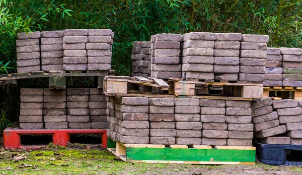 paving stones stacked on pallets, street construction materials, pavement industry - Photo, Image
