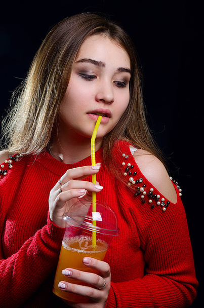 portrait of a girl with a cocktail in the Studio - Photo, image