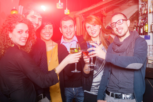 Group of friends in a night сlub - 写真・画像