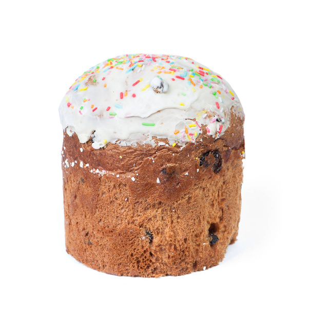 Пасхальний торт з родзинками та білою шапочкою з глазурованого та кольорового
 - Фото, зображення