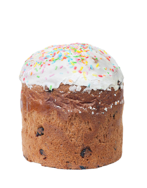 Пасхальний торт з родзинками та білою шапочкою з глазурованого та кольорового
 - Фото, зображення