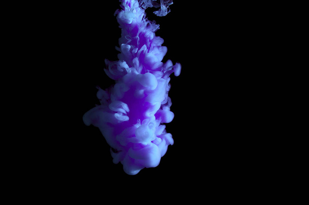 paint stream in water, colored ink cloud, abstract background, process of liquefaction blue dye on a black background - Фото, изображение