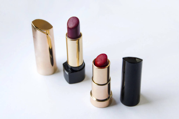 Beautiful bright lipstick in a gold box - Foto, imagen