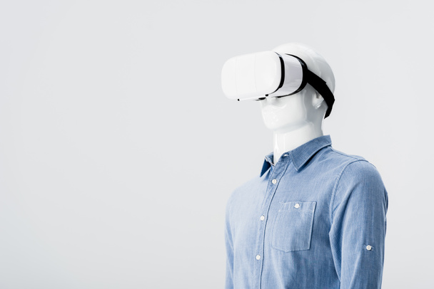 plastic mannequin in clothes with Virtual reality headset isolated on grey with copy space - Fotó, kép