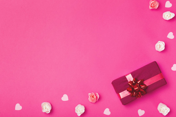 background of gifts, boxes wrapped in decorative paper on a colored background, top view, holiday concept - Photo, Image