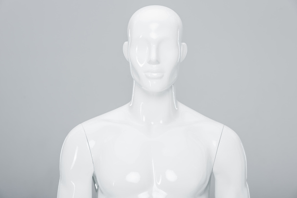 white plastic mannequin doll isolated on grey  - Фото, зображення