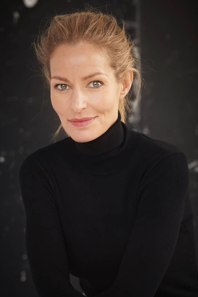 Attractive blond hair mature woman studio portrait  - Valokuva, kuva