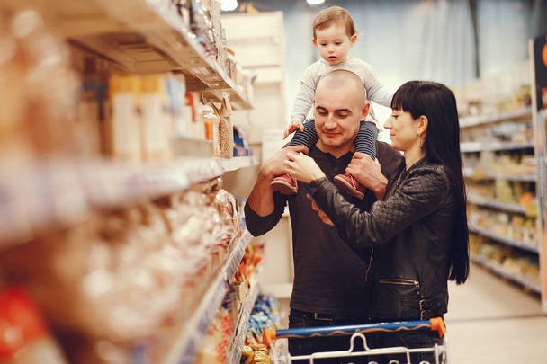 Family in a supermarket - Photo, Image