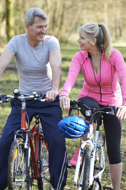 Mature Couple On Cycle Ride In Countryside Together - Photo, Image