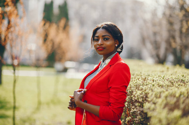 Black woman in a park - Fotó, kép
