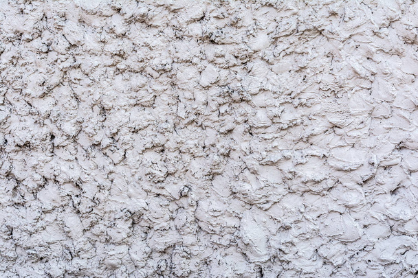 gray texture of a concrete wall, layer of decorative plaster, abstract background - Foto, immagini