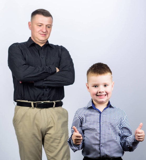 family day. happy child with father. business partner. father and son in business suit. fashion. trust values. fathers day. small boy with dad businessman. Collaboration is a key to best results - Foto, afbeelding