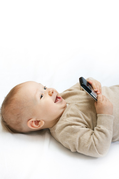 Маленький хлопчик з мобільним телефоном
 - Фото, зображення
