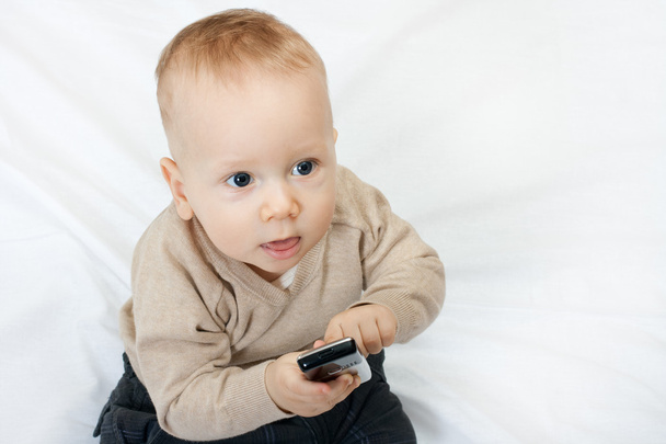 Little boy with mobile phone - Photo, Image