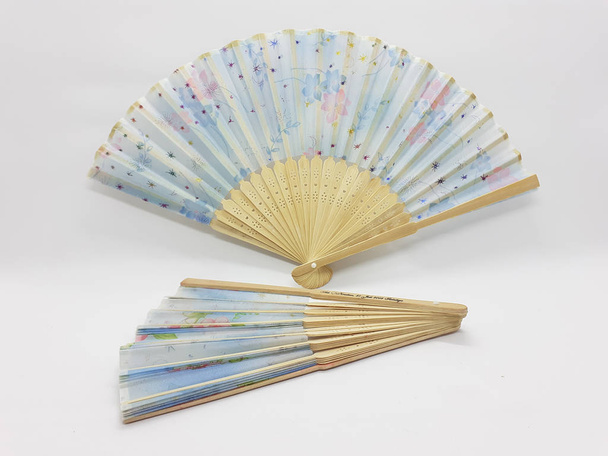 Wooden Bamboo Silk Folding Fan Chinese Japanese Vintage Retro Style Handmade Silk Floral Pattern Hand Fan with a Fabric Sleeve and Tassels for Home Decoration Party Wedding or Dancing Gift - Image  - Φωτογραφία, εικόνα
