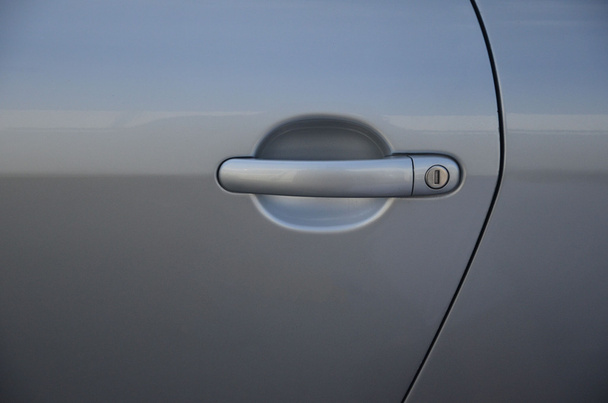 kolu ve arabanın kapısını anahtar deliği - Fotoğraf, Görsel
