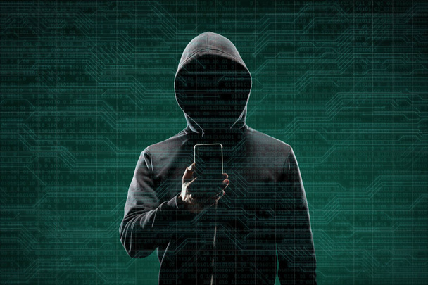 Počítačový hacker v masce a mikina abstraktní binární pozadí. Zakryt snědou tvář. Údaje zloděj, internetové podvody, darknet a cyber bezpečnostní koncepce. - Fotografie, Obrázek