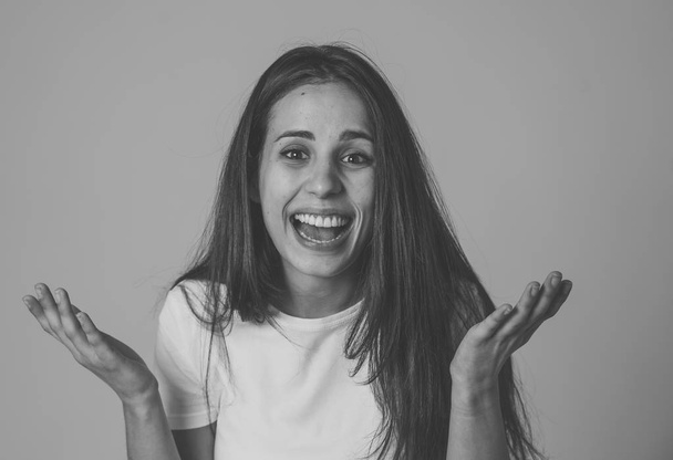 Portrait of beautiful shocked woman hearing good news or having great success with surprised and happy face. Making cheerful gestures. Facial Expression, Human Emotions and celebration. Copy space. - Фото, зображення