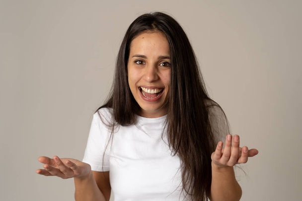 Portrait of beautiful shocked woman hearing good news or having great success with surprised and happy face. Making cheerful gestures. Facial Expression, Human Emotions and celebration. Copy space. - Foto, Imagen
