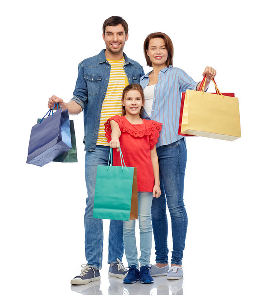 happy family with shopping bags - Фото, изображение