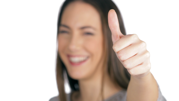 Szczęśliwy kobieta śmiech wskazując kciuka w górę na białym tle - Materiał filmowy, wideo