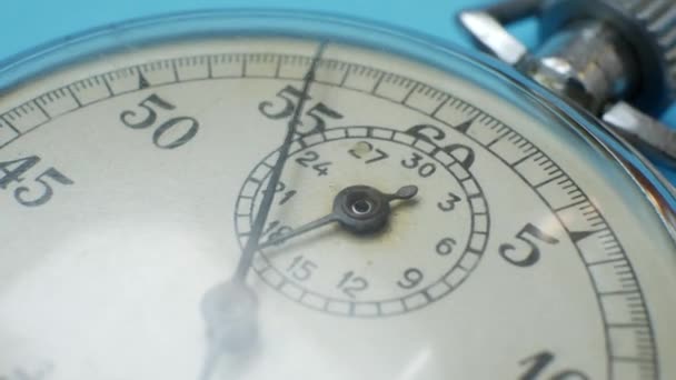 Analogue Metal Stopwatch on Blue Background - Footage, Video