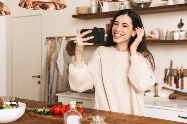 Portrait of european brunette woman 30s taking selfie photo on s - Valokuva, kuva