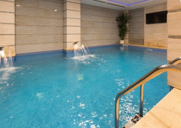 Swimming pool in hotel spa and wellness center - Photo, Image