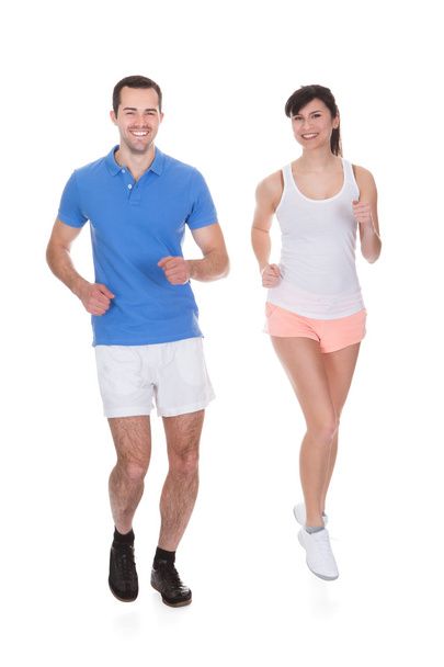 Portrait Of Couple Jogging - Foto, Bild