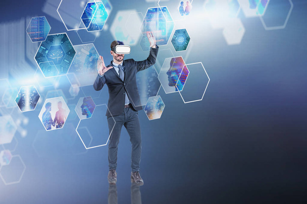 Man in VR headset working with digital screen - Fotografie, Obrázek