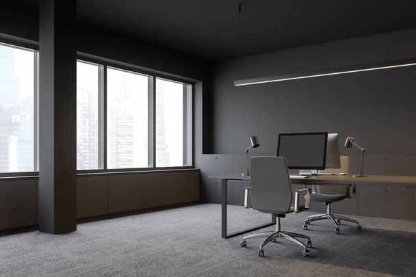 Современное офисное рабочее место с серыми стенами
 - Фото, изображение