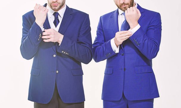 Male hands adjusting business suit close up. Confident in his style. Business people choose formal clothing. Every detail matters. Stylish details business appearance. Business style dress code - Photo, image
