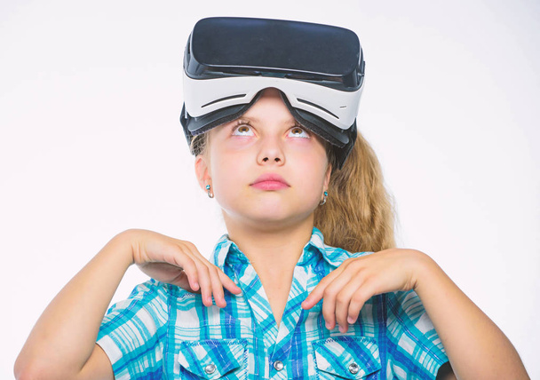 Virtual education for school pupil. Happy kid use modern technology virtual reality. Get virtual experience. Girl cute child with head mounted display on white background. Virtual reality concept - Fotó, kép