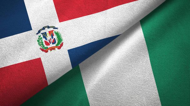 Dominikanische Republik und Nigeria zwei Flaggen Textilstoff, Textur - Foto, Bild